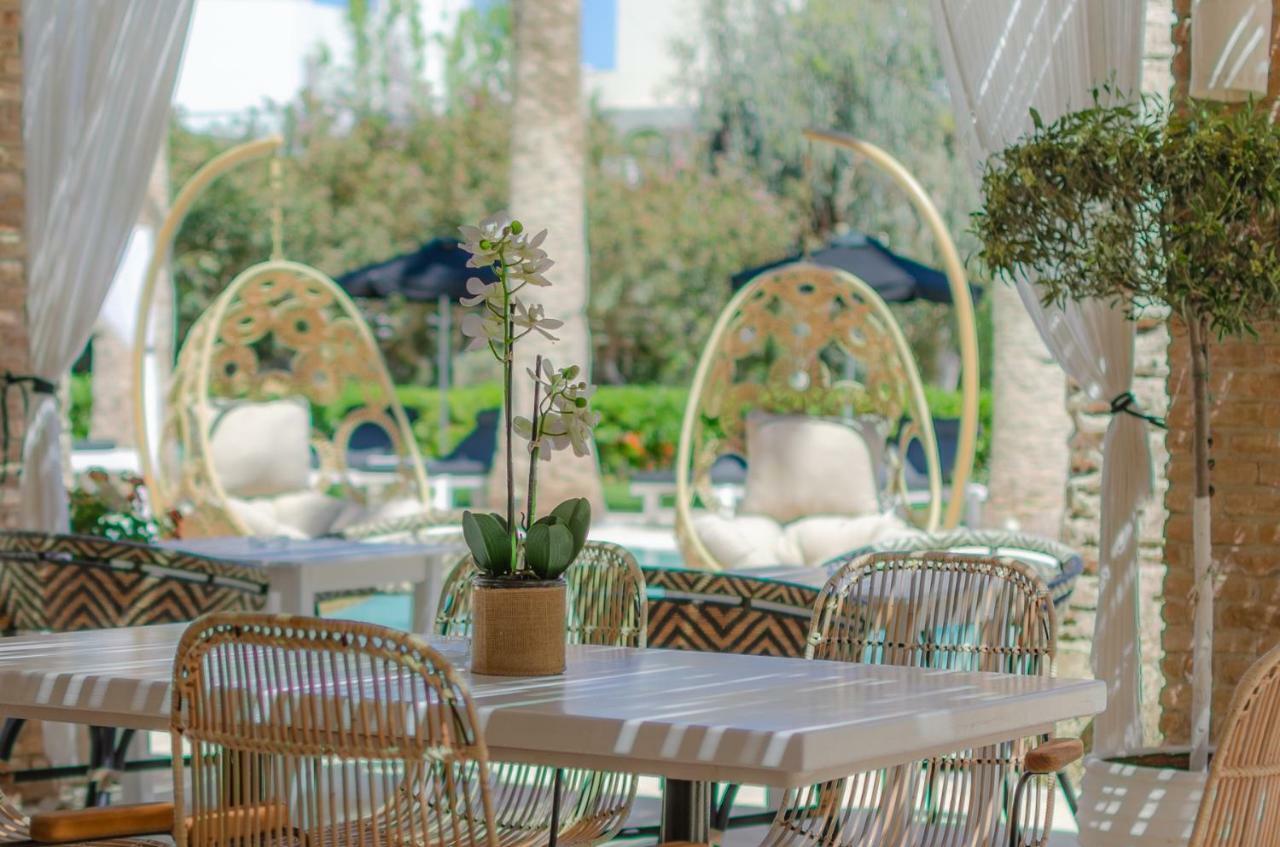 Drossia Palms Hotel And Nisos Beach Suites Malia Exterior foto